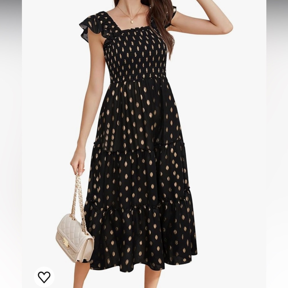black smocked dress with gold polka dots